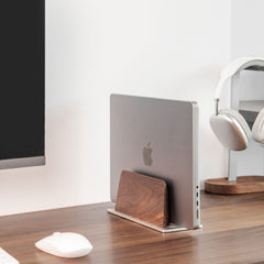 Super Wood Vertical Stand organizing a laptop vertically on a warm wood desk with monitor, mouse, and headphones | Cyber Vintage