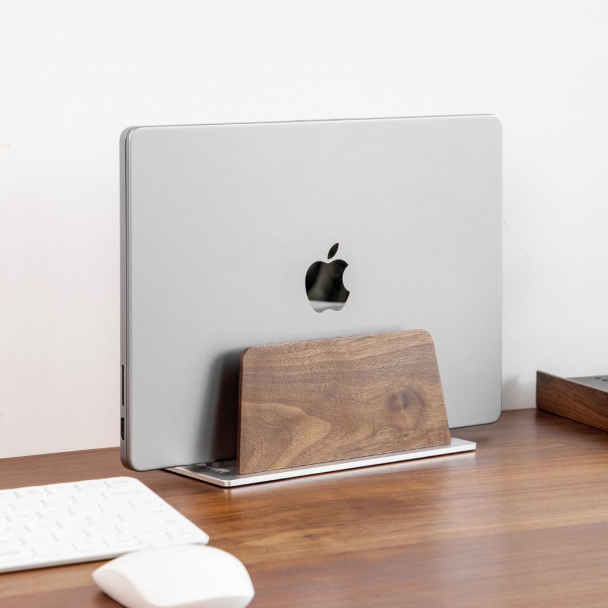 Super Wood Vertical Stand with natural walnut wood finish holding a laptop upright on a clean desktop setup | Cyber Vintage