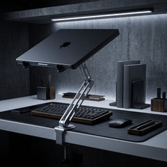 Super Laptop Stand Flex desk clamp stand supporting a laptop
