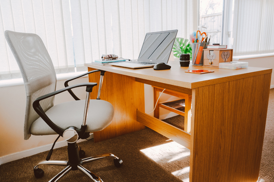 A minimalist desk setup with a laptop