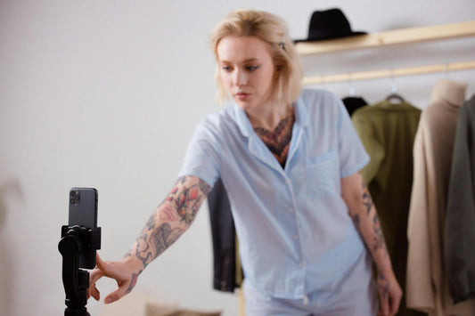 A woman using a phone stand