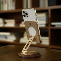 Elite Wooden Phone Stand displaying a smartphone in an upright position in a book-filled room | Cyber Vintage
