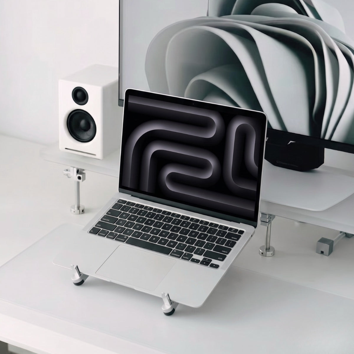 FlexForm adjustable laptop stand for ergonomic minimalist desk setup